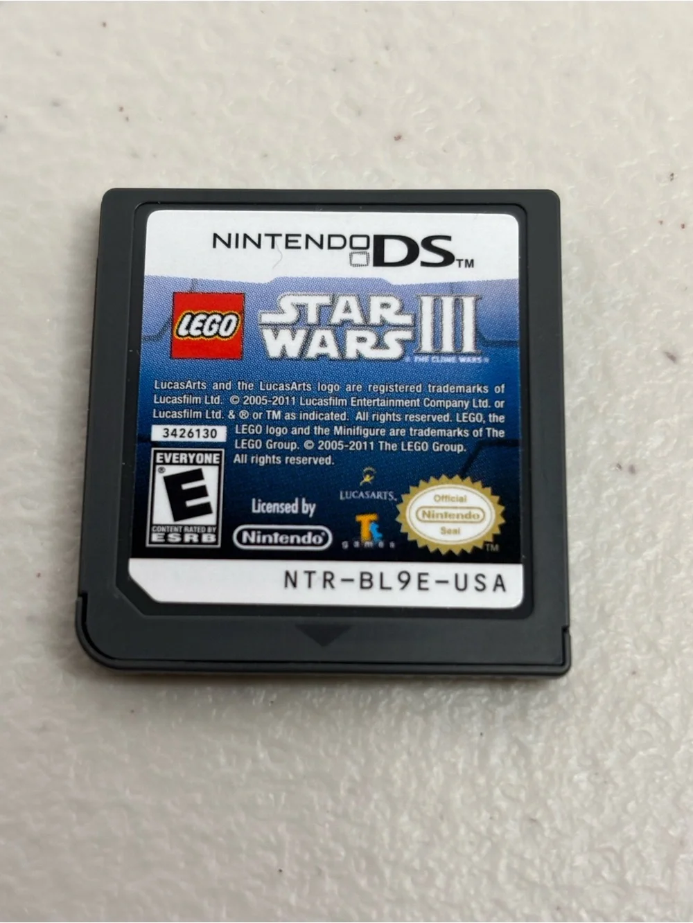 Nintendo DS Lite Bundle - Complete Handheld Console with Charger and Two Games